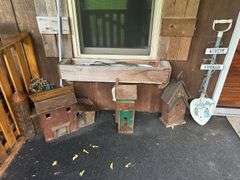 Decorative Birdhouses and Welcome Sign