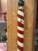 Decorative Barber Pole with 'Haircut & Shave' Signage