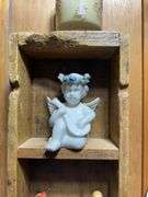 Collectible Figurines in Wooden Display Case