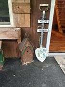 Decorative Birdhouses and Welcome Sign