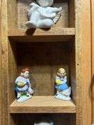 Collectible Figurines in Wooden Display Case
