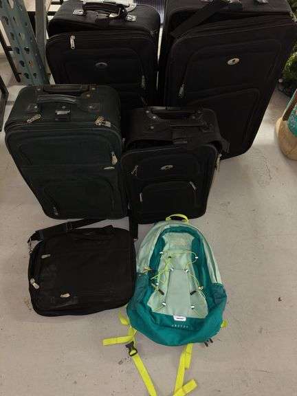 Luggage Assortment: Rolling Suitcases, Shoulder Bag & The North Face Backpack image