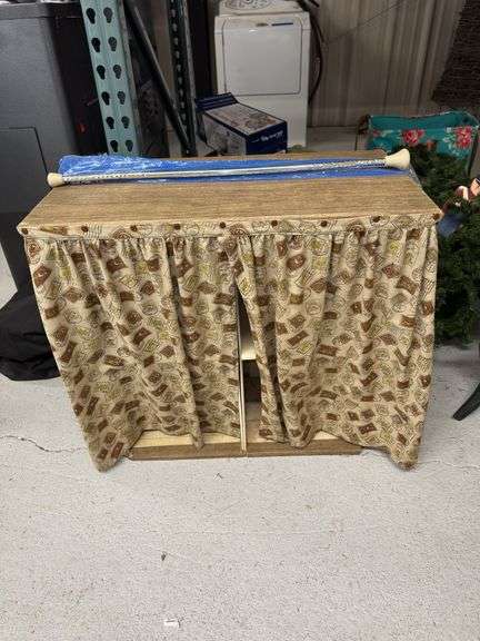 Wooden Cabinet with Stamp Pattern Curtain and Chrome Poles image
