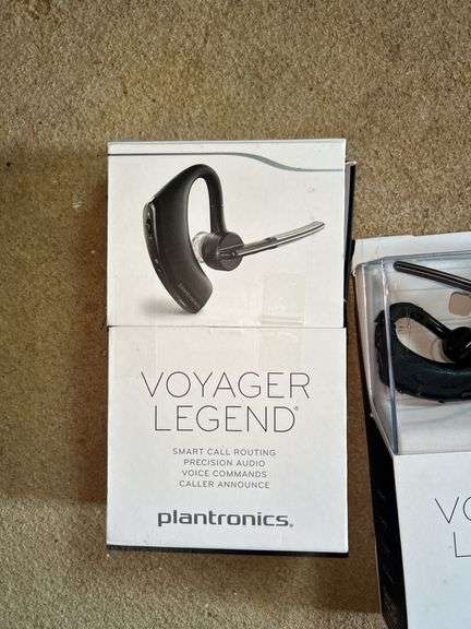Two Plantronics Voyager Legend Bluetooth Headsets