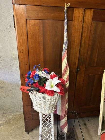 Wicker Plant Stand with Flowers, Umbrella Holder, and Decorative Flag image
