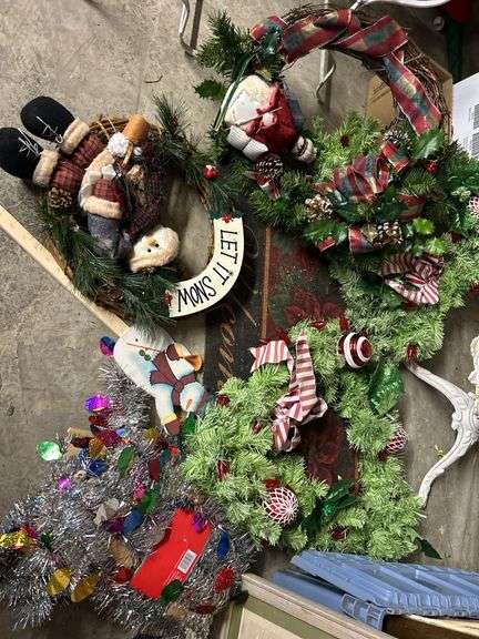 Assorted Holiday Decorations: Wreaths, Garland, and Welcome Mat image