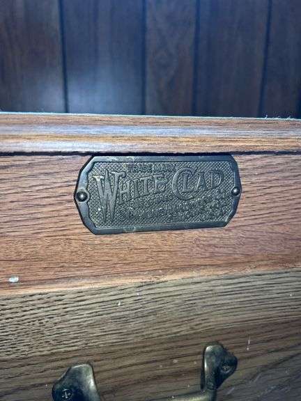 White Clad Simmons Hardware Oak Cabinet with Coca-Cola Bottle Opener