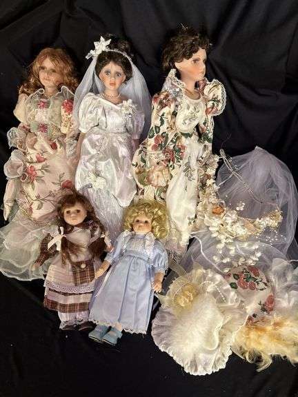 Collection of Porcelain Dolls with Dresses and Accessories image