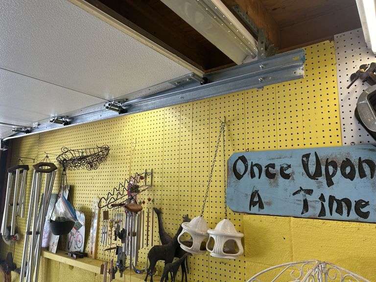 Assorted Home Decor Items: Wind Chimes, Signs, and More image