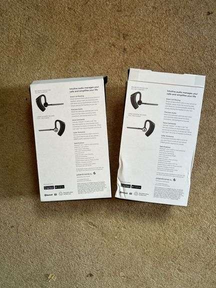 Two Plantronics Voyager Legend Bluetooth Headsets