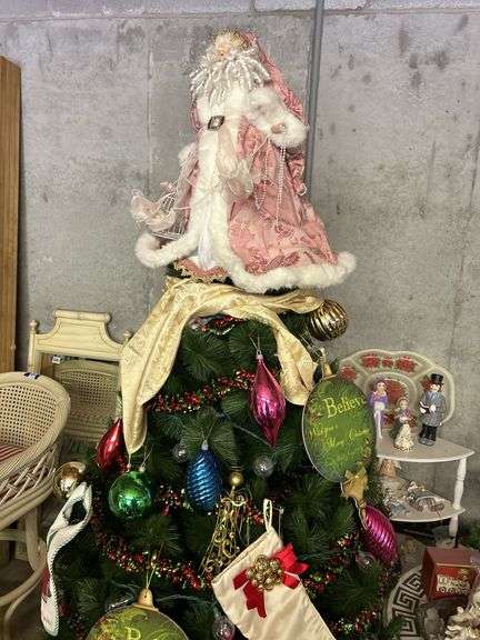 Decorated Christmas Tree with Pink Santa Topper image