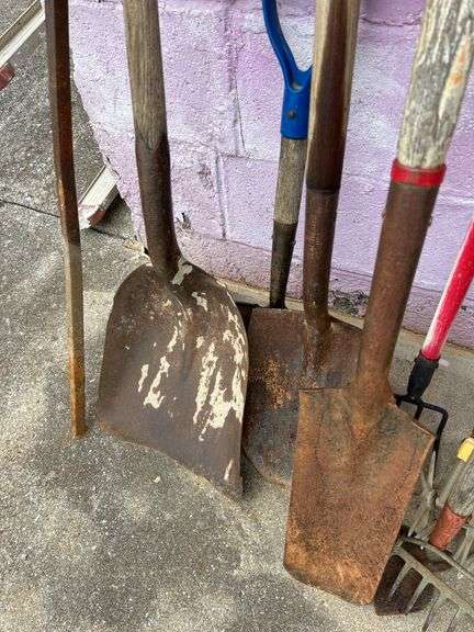 Collection of Garden Tools: Shovels, Rakes, and More