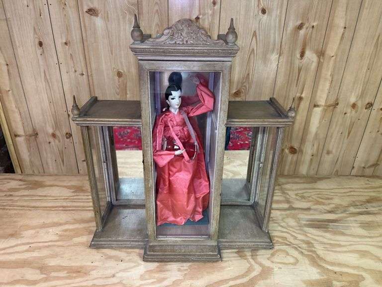 Asian Doll in Display Cabinet image