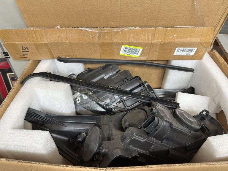 Box of Automotive Headlights and Trim image