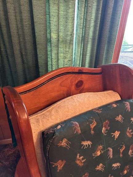 Rustic Wood Armchair with Wildlife Motif Cushions