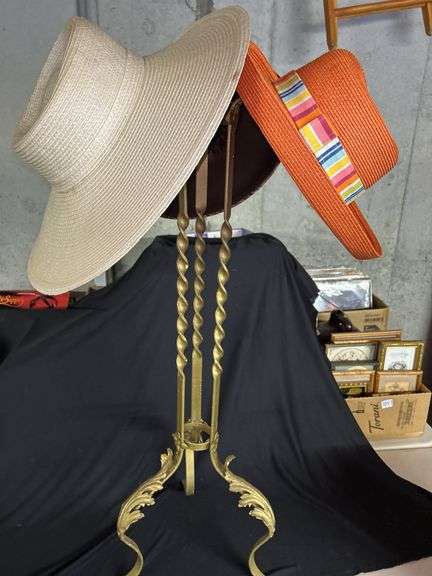Three Ladies' Hats on Metal Display Stand image