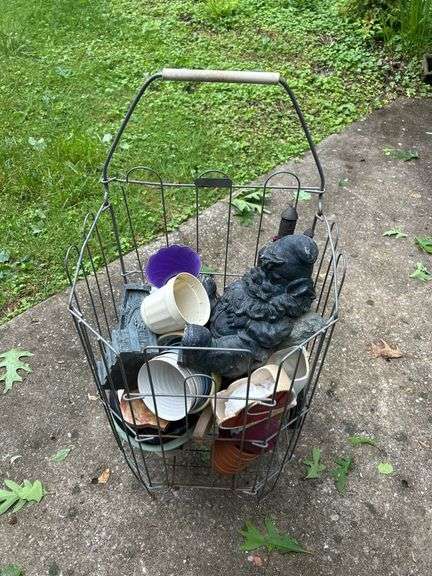 Wire Basket Filled with Garden Decor image
