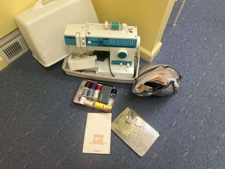 Singer Sewing Machine with Accessories and Material image