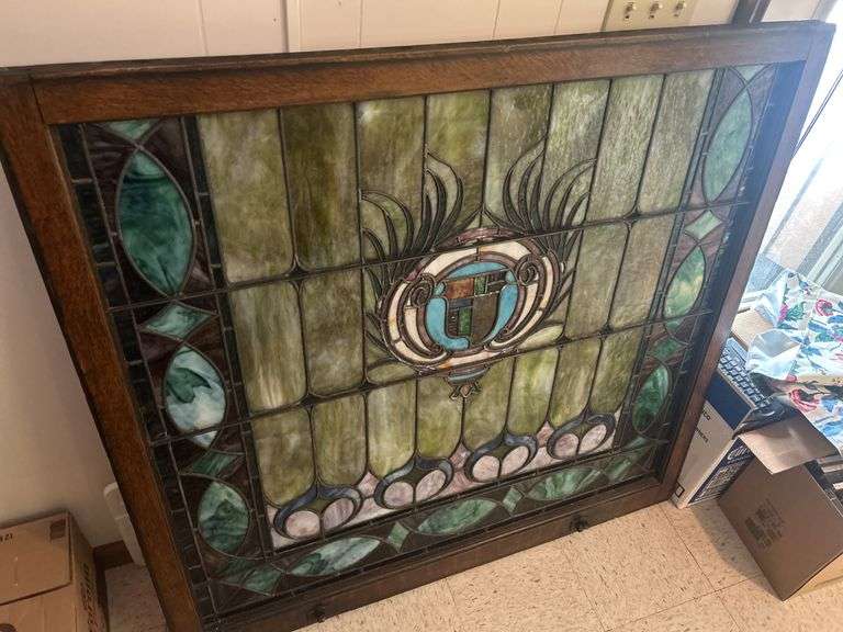 Decorative Stained Glass Window Panel with Central Crest image