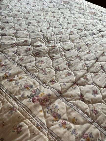 Full Size Wooden Bed Frame with Floral Quilt