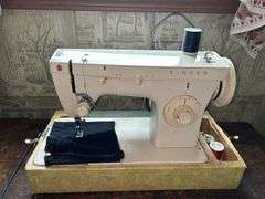 Singer Model 247 Sewing Machine with Treadle Base and Cabinet