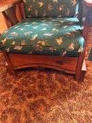 Rustic Wood Armchair with Wildlife Motif Cushions
