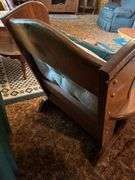 Rustic Wood Armchair with Wildlife Motif Cushions