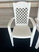Pair of White Plastic Outdoor Armchairs