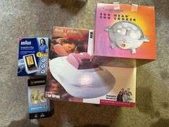 Braun Blood Pressure Monitor, Brinks Door Knob, Sunbeam Vaporizer, and Toastmaster Egg Cooker