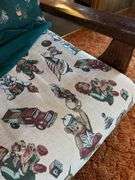 Wooden Rocking Chair with Green Animal Pattern Cushion