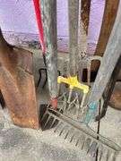 Collection of Garden Tools: Shovels, Rakes, and More
