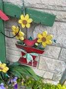 Handmade Garden Decorations: Mushroom Statue and Cardinal Flower Display