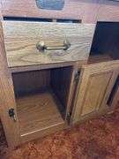 White Clad Simmons Hardware Oak Cabinet with Coca-Cola Bottle Opener
