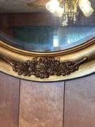 Ornate Mirror, Religious Wall Art, and Candle Holders
