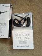 Two Plantronics Voyager Legend Bluetooth Headsets