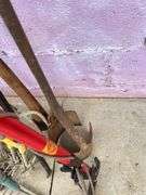 Collection of Garden Tools: Shovels, Rakes, and More