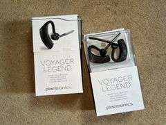 Two Plantronics Voyager Legend Bluetooth Headsets