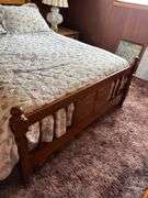 Full Size Wooden Bed Frame with Floral Quilt