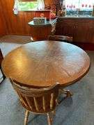 Round Oak Dining Table with Two Chairs