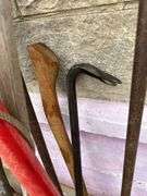 Collection of Garden Tools: Shovels, Rakes, and More