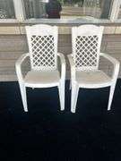 Pair of White Plastic Outdoor Armchairs