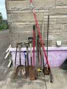 Collection of Garden Tools: Shovels, Rakes, and More