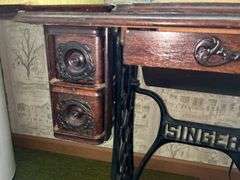 Singer Model 247 Sewing Machine with Treadle Base and Cabinet