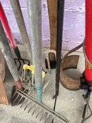Collection of Garden Tools: Shovels, Rakes, and More