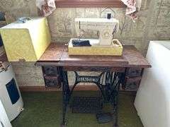 Singer Model 247 Sewing Machine with Treadle Base and Cabinet