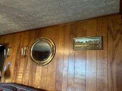 Ornate Mirror, Religious Wall Art, and Candle Holders