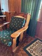 Rustic Wood Armchair with Wildlife Motif Cushions