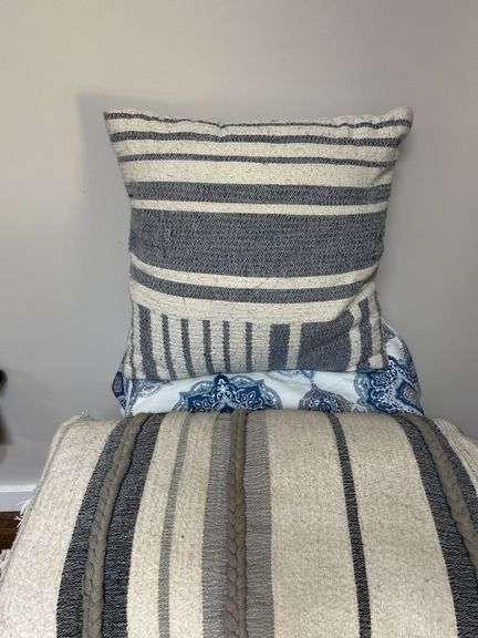 Assorted Decorative Items: Pillows, Throw Blanket, and Storage Basket image