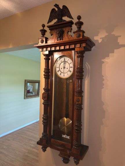 Ornate Carved Wooden Wall Clock with Eagle Detail image