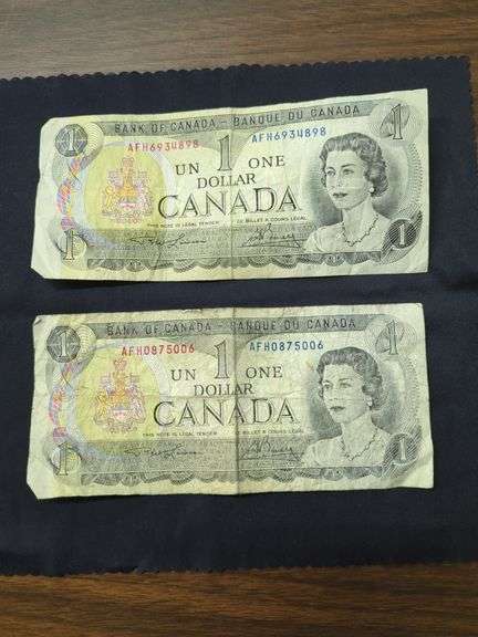 Two Canadian $1 Bills image